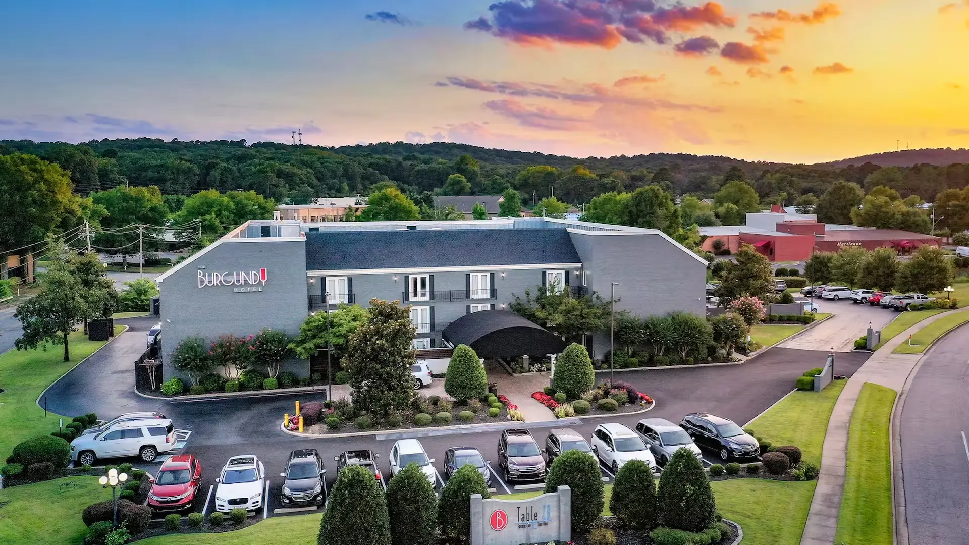 Aerial view of The Burgundy Hotel at sunset